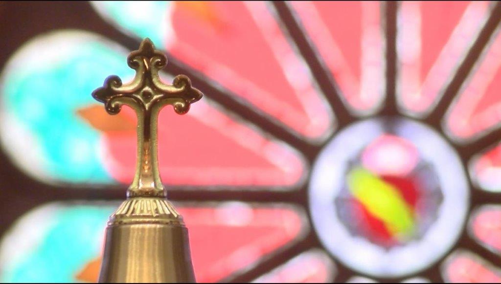 catholic church cross stained glass KXAN