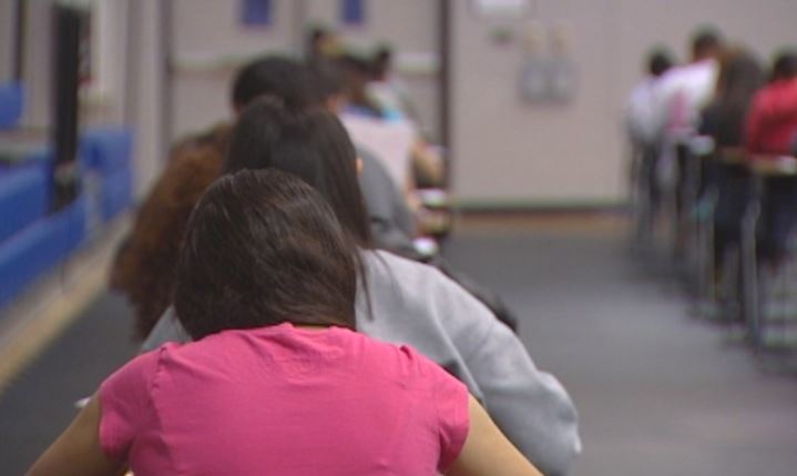 Row of students in a classroom_487894