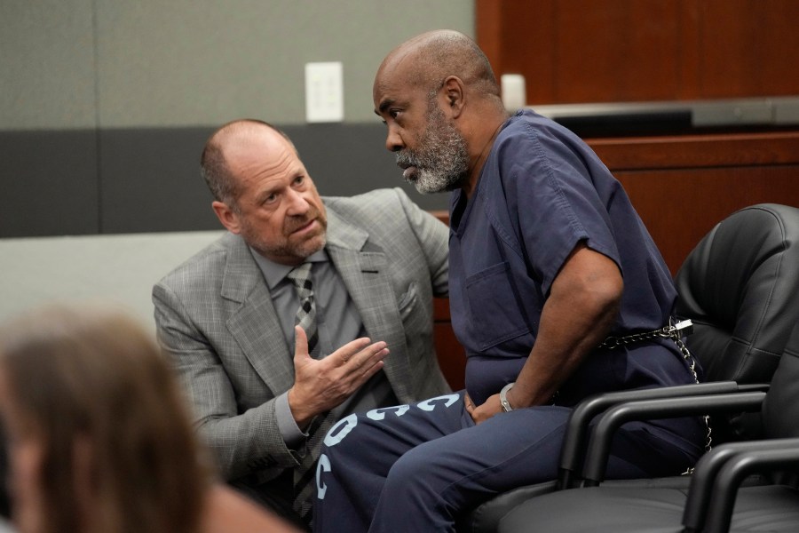 Duane "Keffe D" Davis, right, speaks with attorney Ross Goodman in court Thursday, Oct. 19, 2023, in Las Vegas. Davis has been charged with killing Tupac Shakur in 1996. (AP Photo/John Locher, Pool)