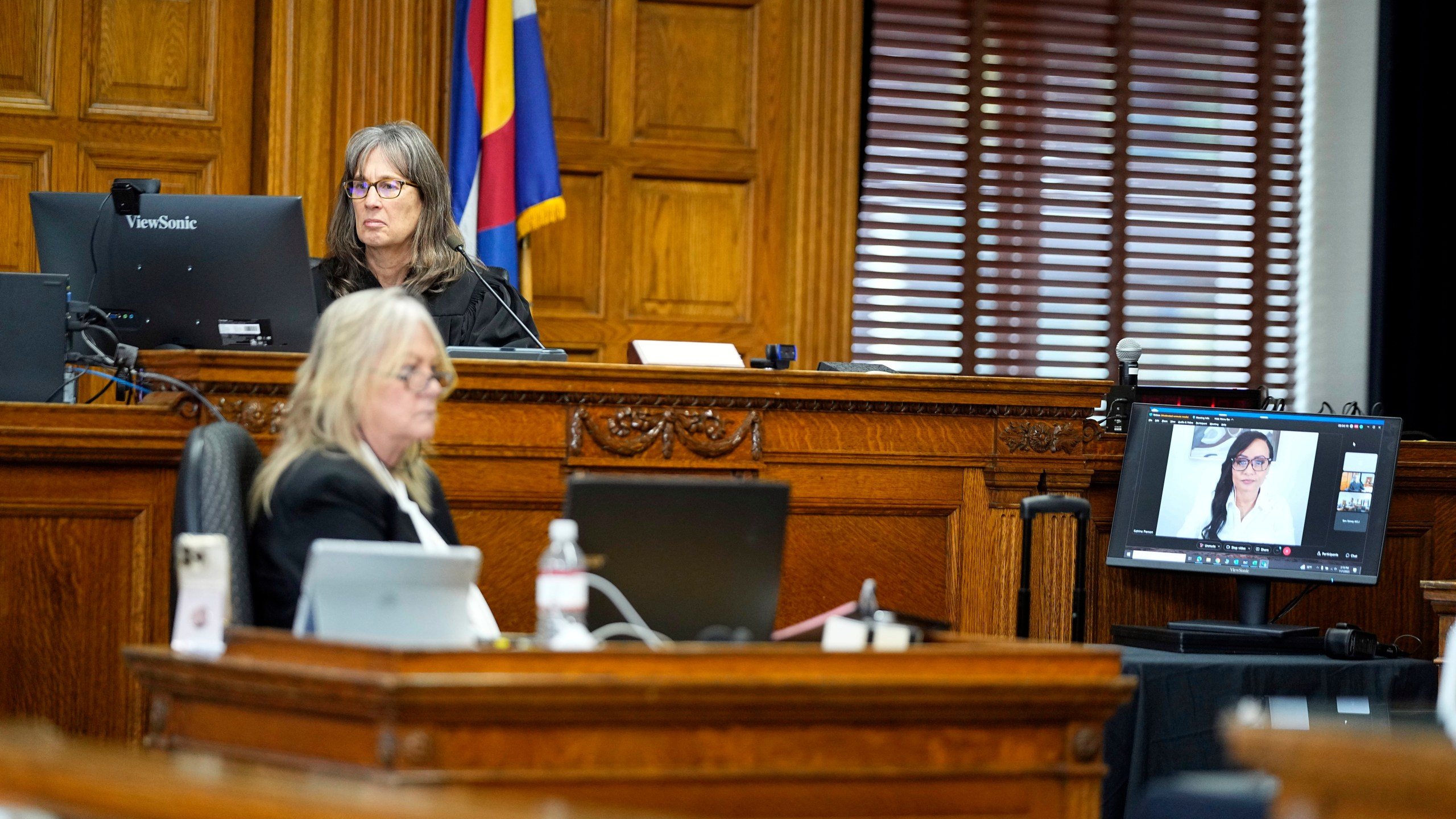 Katrina Pierson testifies remotely as Judge Sarah B. Wallace presides during a hearing for a lawsuit to keep former President Donald Trump off the state ballot, Wednesday, Nov. 1, 2023, in Denver. (AP Photo/Jack Dempsey, Pool)