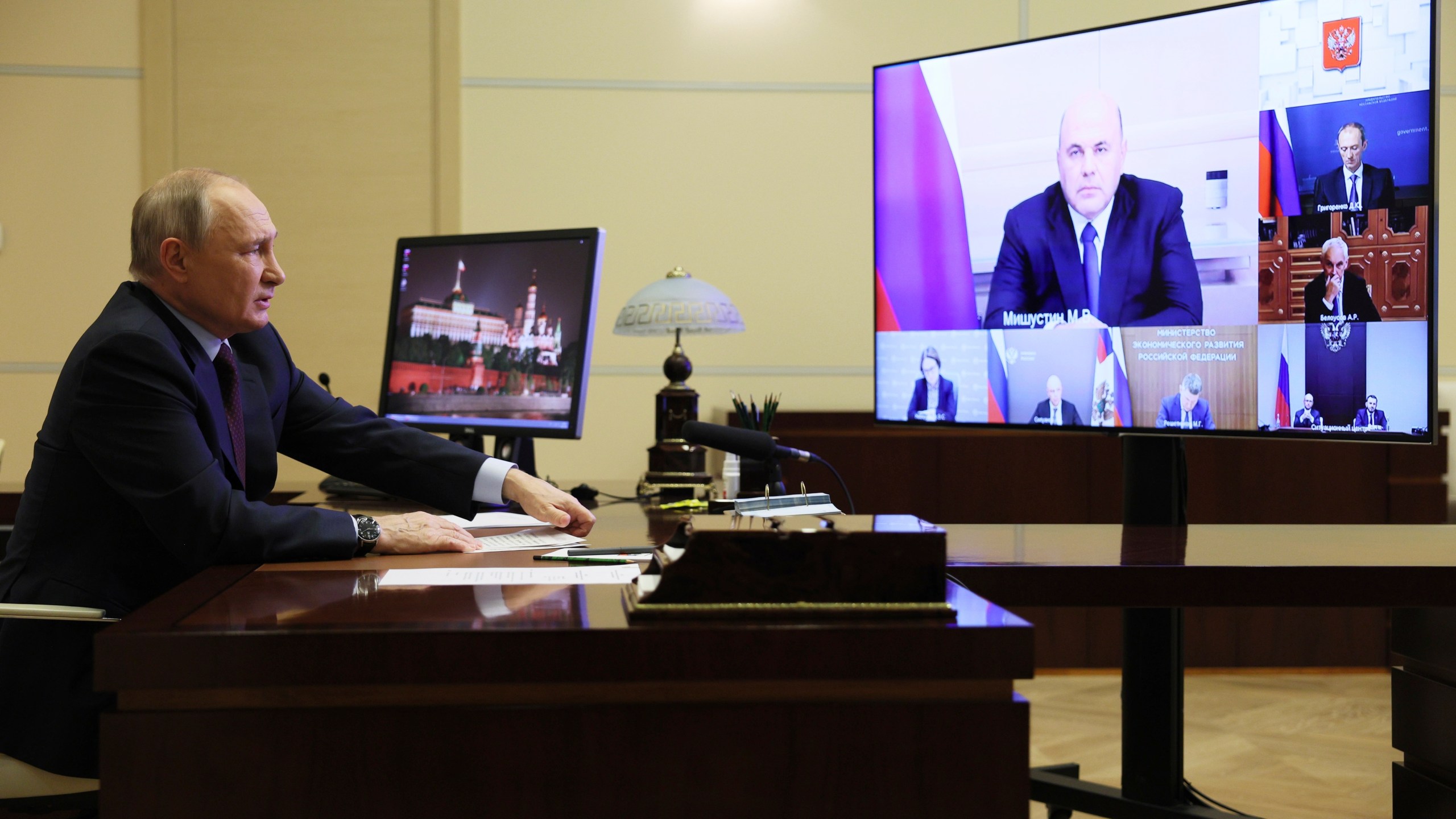 Russian President Vladimir Putin chairs a meeting on economic issues via videoconference at the Novo-Ogaryovo state residence outside Moscow, Russia, Wednesday, Nov. 1, 2023. Russian Prime Minister Mikhail Mishustin is seen on the screen. (Gavriil Grigorov, Sputnik, Kremlin Pool Photo via AP)