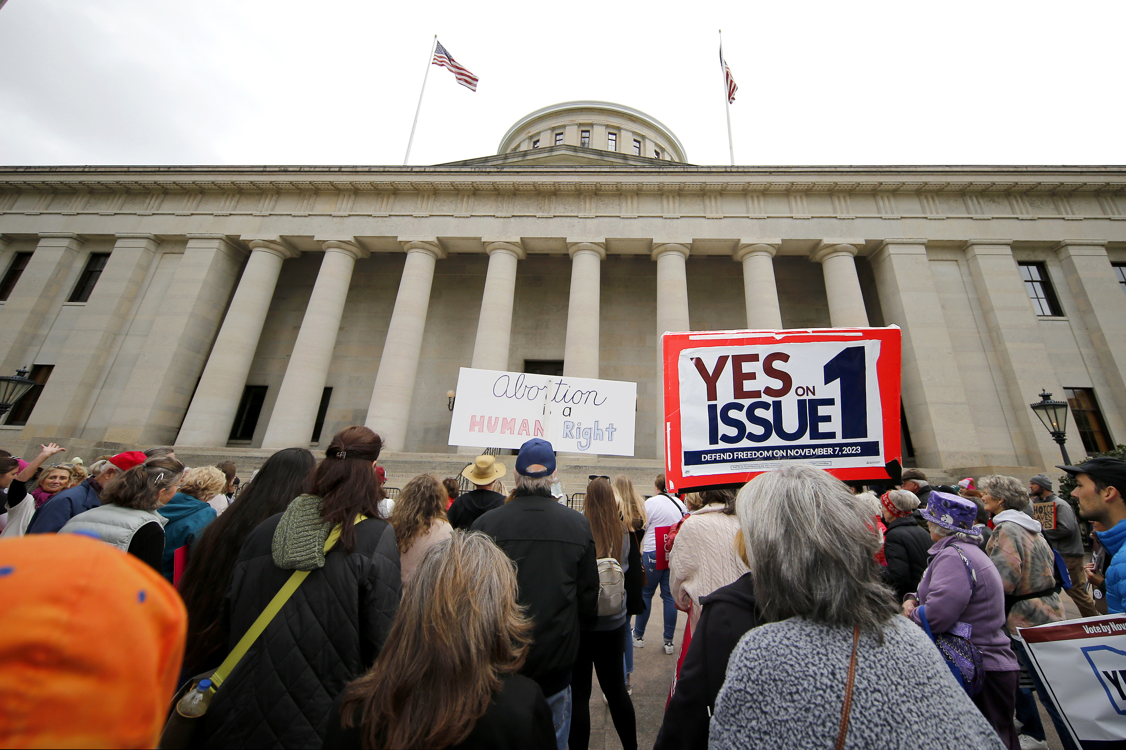 FILE - Supporters of Issue 1 attend a rally for the Right to Reproductive Freedom amendment held by Ohioans United for Reproductive Rights at the Ohio State House in Columbus, Ohio, Oct. 8, 2023. Campaigning over the issue, which will be decided Tuesday, is expected to be a preview of abortion battles across the country in 2024. The measure, known as Issue 1, is the only abortion question on any state ballot this year. (AP Photo/Joe Maiorana, File)