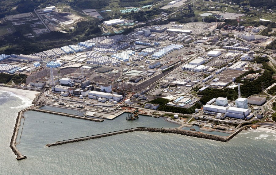 FILE - This aerial view shows the Fukushima Daiichi nuclear power plant in Fukushima, northern Japan, on Aug. 24, 2023, shortly after its operator Tokyo Electric Power Company Holdings TEPCO began releasing its first batch of treated radioactive water into the Pacific Ocean. The tsunami-damaged Fukushima Daiichi nuclear power plant began its third release of treated and diluted radioactive wastewater into the sea Thursday, Nov. 2, 2023 after Japanese officials said the two earlier releases ended smoothly. (Kyodo News via AP, File)