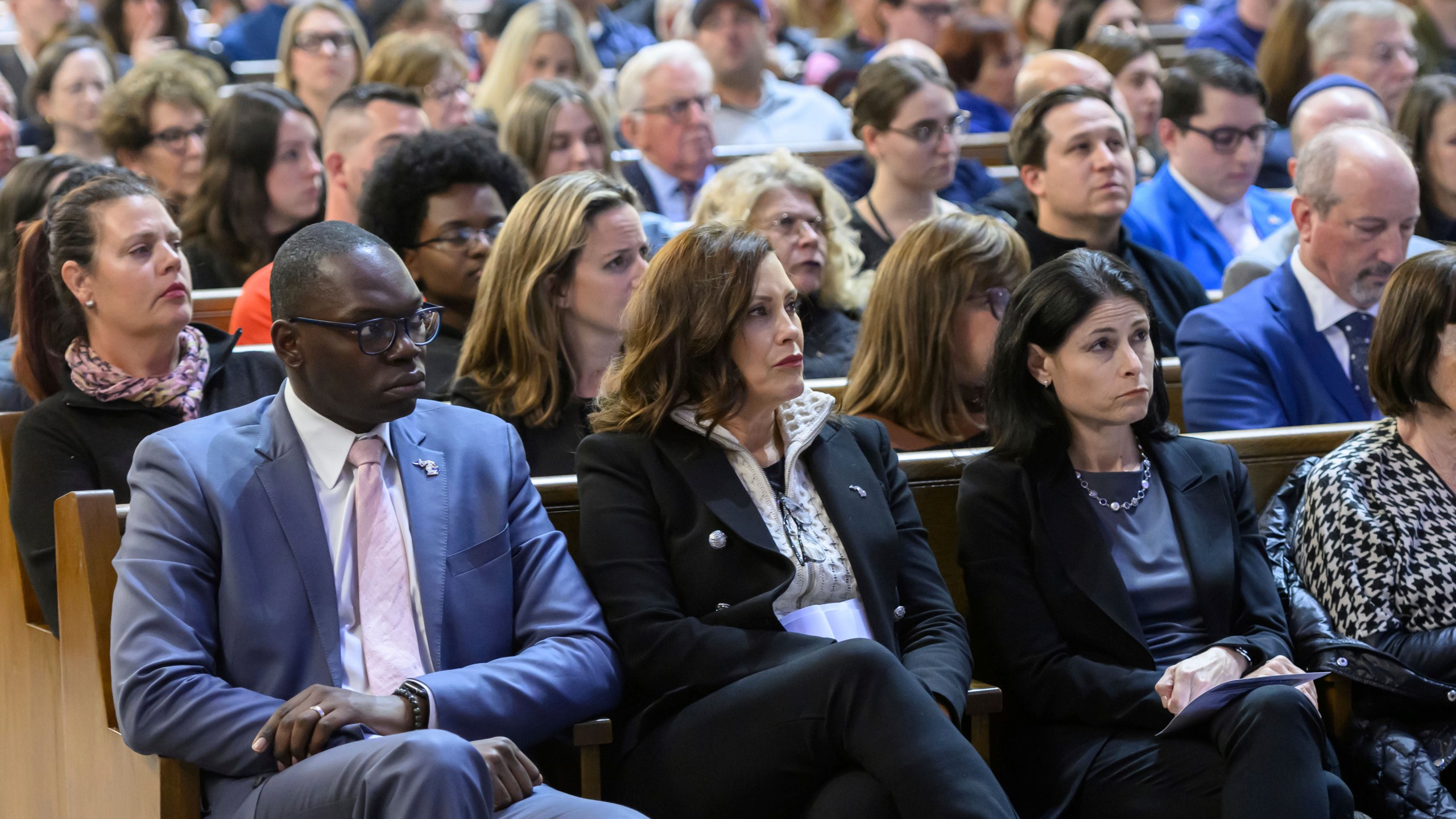 FILE - Michigan Lt. Gov. Garlin Gilcrhist, left, Gov. Gretchen Whitmer and attorney general Dana Nessel attend a community support event at Congregation Shaarey Zedek, in Southfield, Michigan on October 9, 2023. Michigan Democrats have warned the White House that Biden’s response to the Israel-Hamas war could put his reelection campaign in jeopardy in the key swing state next year. The state holds the largest concentration of Arab Americans in the nation and many in the community are pledging to coalesce against Biden’s reelection campaign unless he calls for a ceasefire in the war. (David Guralnick/Detroit News via AP, File)