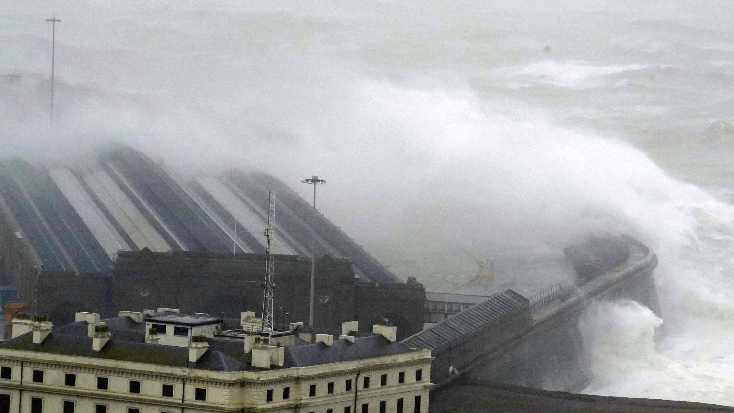 Waves crash over the harbour wall as Storm Ciaran brings high winds and heavy rain along the south coast of England, in Folkestone, Thursday, Nov. 2, 2023. Winds up to 180 kilometers per hour (108 mph) slammed France's Atlantic coast overnight as Storm Ciaran lashed countries around western Europe, uprooting trees, blowing out windows and leaving 1.2 million French households without electricity Thursday. Strong winds and rain also battered southern England and the Channel Islands, where gusts of more than 160 kph (100 mph) were reported. (Gareth Fuller/PA via AP)